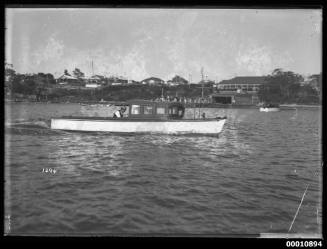 Motor launch near the St George Motor Boat Club