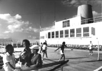 Photograph depicting passengers on ORIANA's sports deck