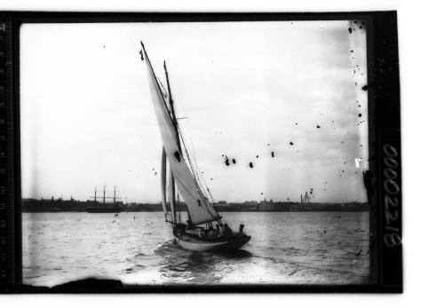 Gaff cutter off Garden Island, Sydney Harbour, with Garden Island visible in the background