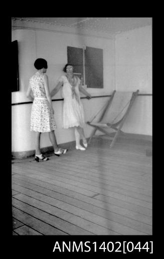 Two female passengers conversing on deck (E & A Line) negative of ANMS1402[043]