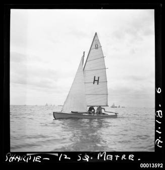 12 metre Sharpie possibly on Botany Bay ..this is not Sydney Harbour on