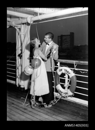 Couple modelling evening wear