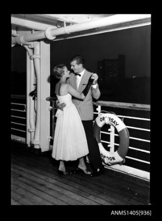 Couple modelling evening wear