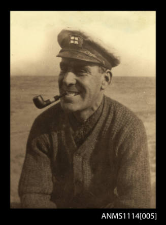Frank Douglas Fletcher smoking a pipe