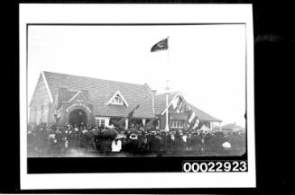 Crowd of people outside the Missions to Seamen building