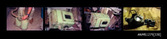 Strip of four colour negatives, the first of a person holding up two airtanks, the following two of an underwater camera case, and the fourth of an underwater camera and Rolleiflex camera