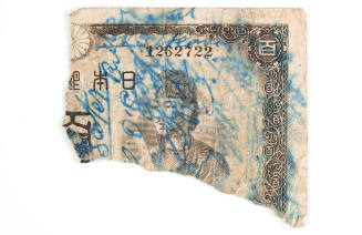 Piece of a Japanese 100 Yen note