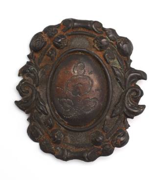 Buckle recovered from the wreck of the DUNBAR