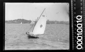 16-foot skiff MIMOSA under sail on Sydney Harbour