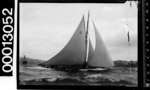 Sailing vessel with the number '15' on the mainsail, Sydney Harbour