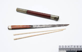 Mess kit comprised of a knife and two chopsticks housed in a wooden scabbard