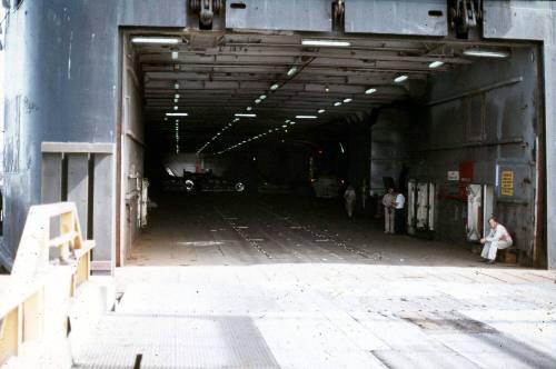 Slide depicting the loading dock of a ship