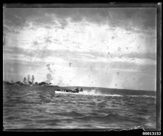 Speedboat on Kogarah Bay  displaying the text 'A 4'