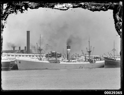 CITY OF DIEPPE and other cargo vessels docked at a wharf