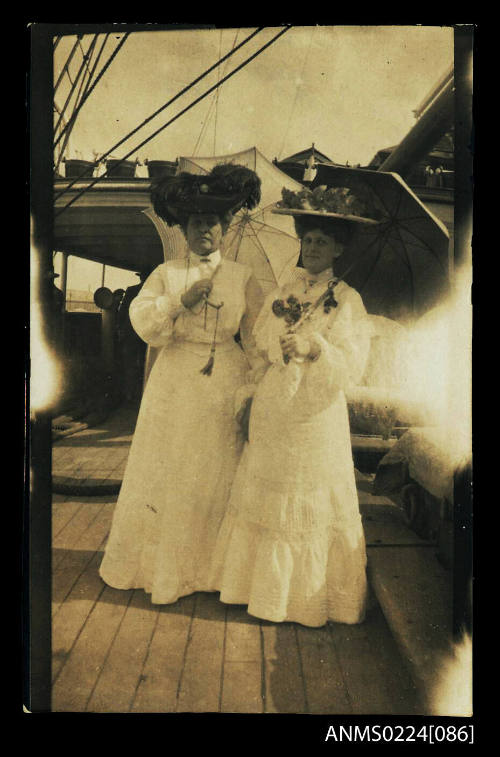 Women passengers with parasols